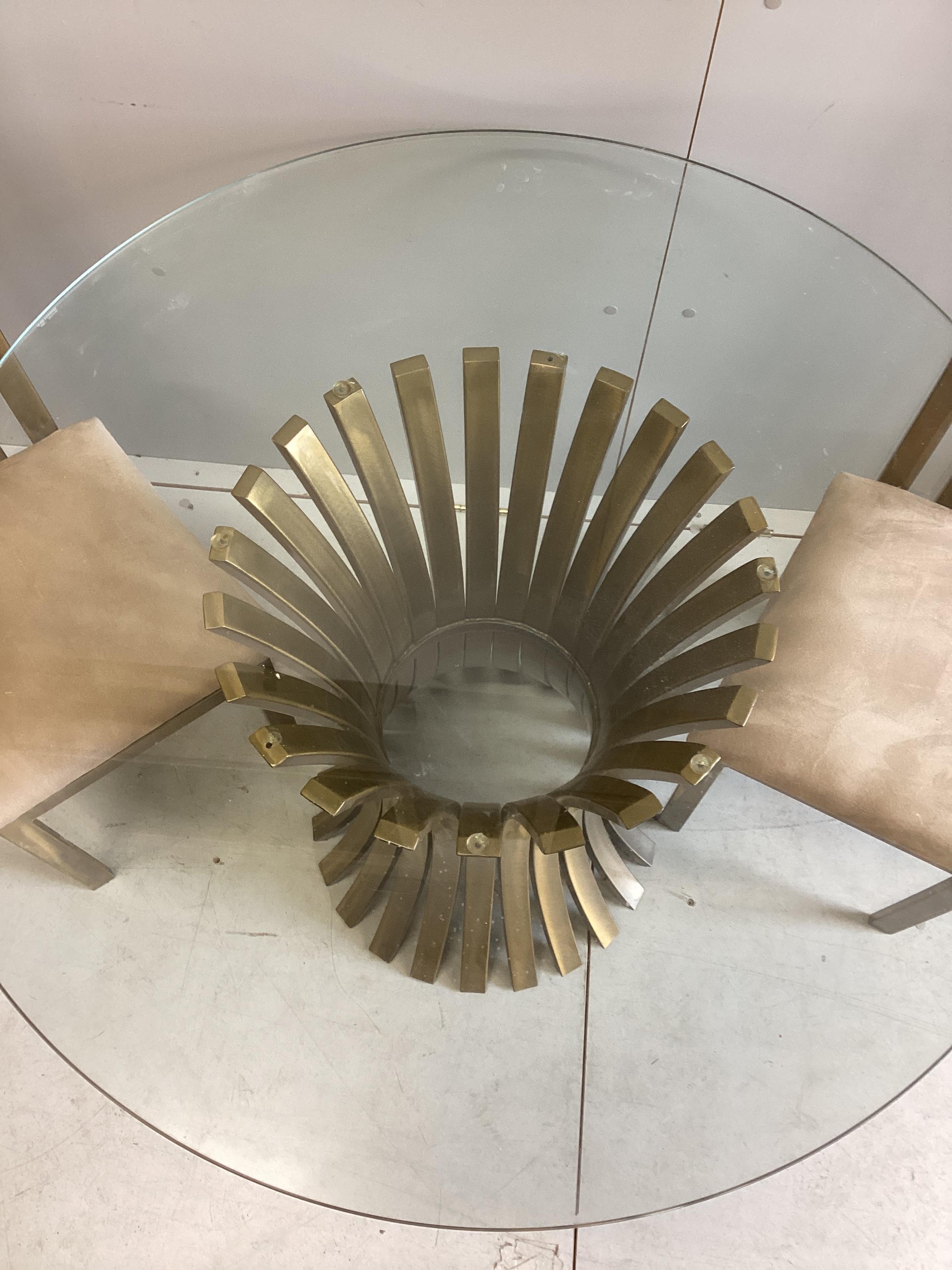 A Contemporary Italian design circular gilt metal glass top table, diameter 100cm, height 74cm, and two chairs